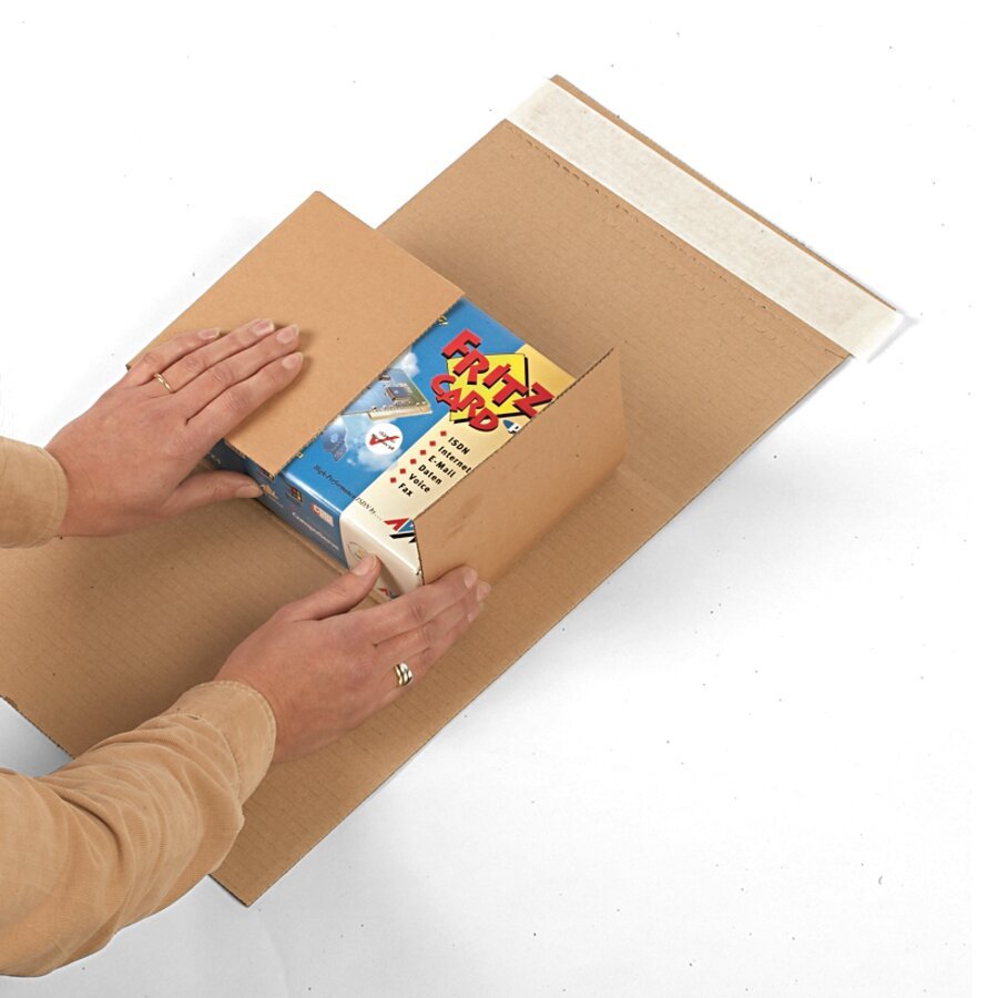 ... Packgut einlegen und die Innenklappen umschlagen... ... Packgut einlegen und die Innenklappen umschlagen...